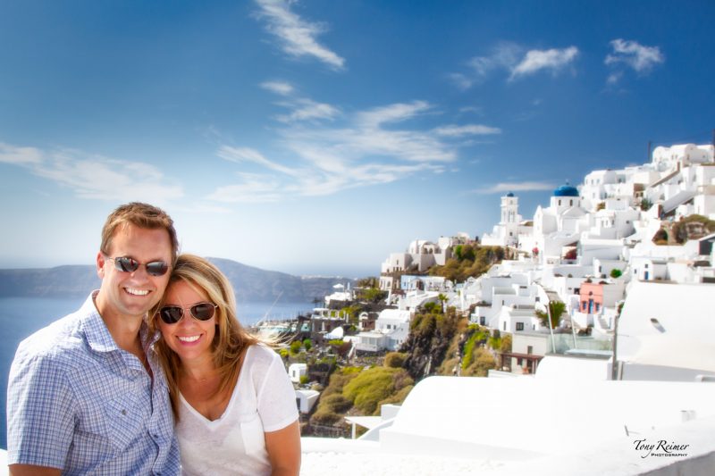 Tony and Tiffany Reimer, the Traveling Tooth Fairy and developer of a unique tooth fairy idea. Traveling in Santorini, Greece. 